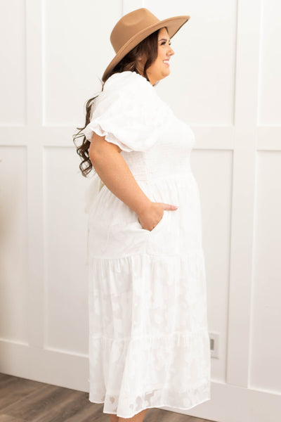 Side view of a plus size white dress