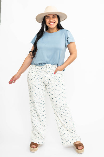 Large ivory floral pants with pockets and blue flowers