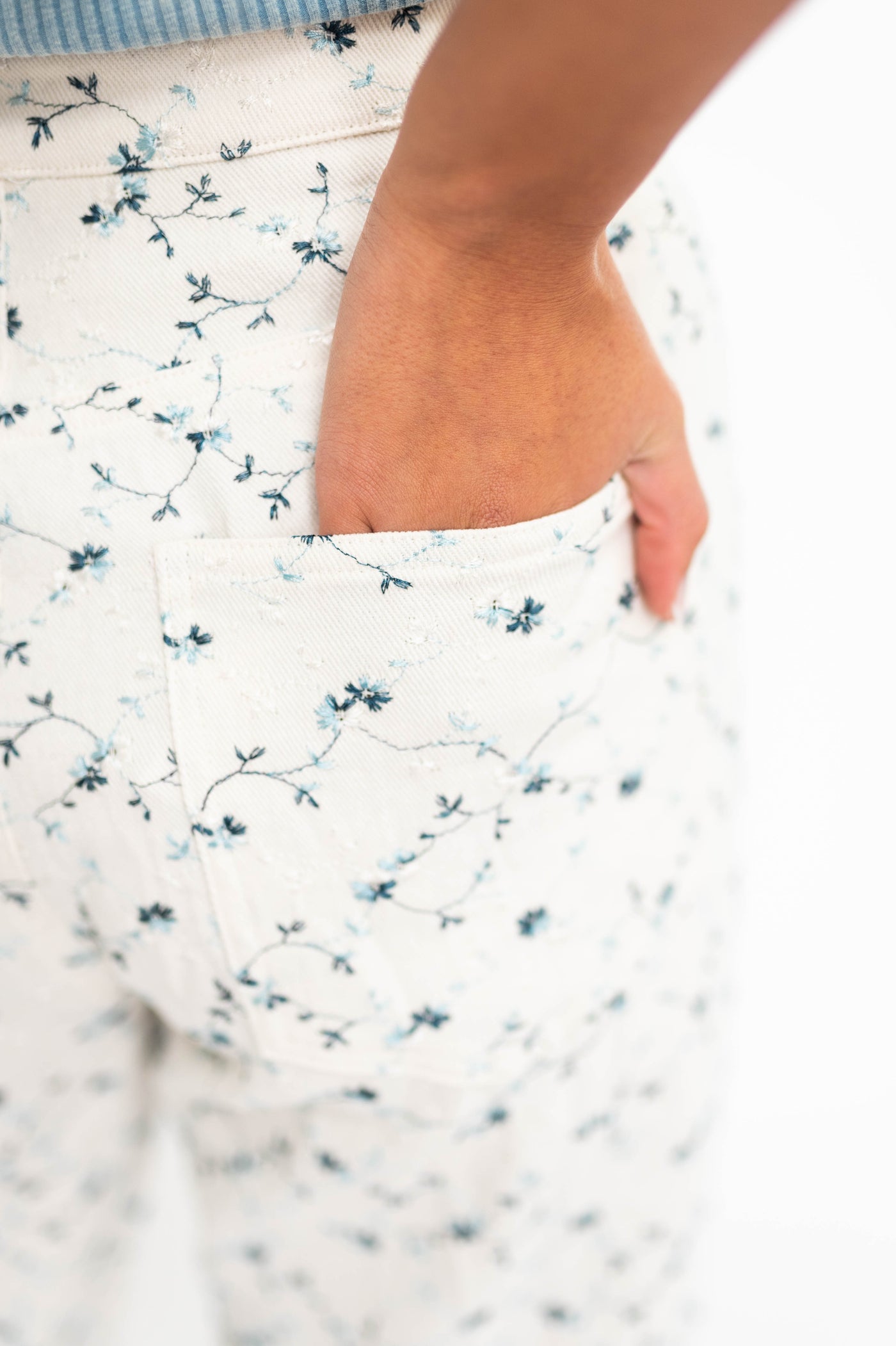 Ivory floral pants with back pockets