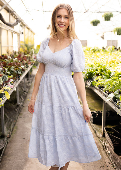 Short sleeve light blue dress with fitted bust and sweetheart neck