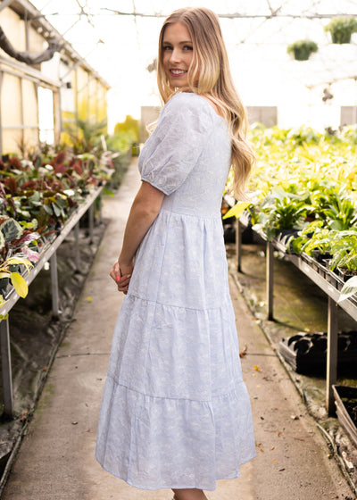 Side view of a light blue dress
