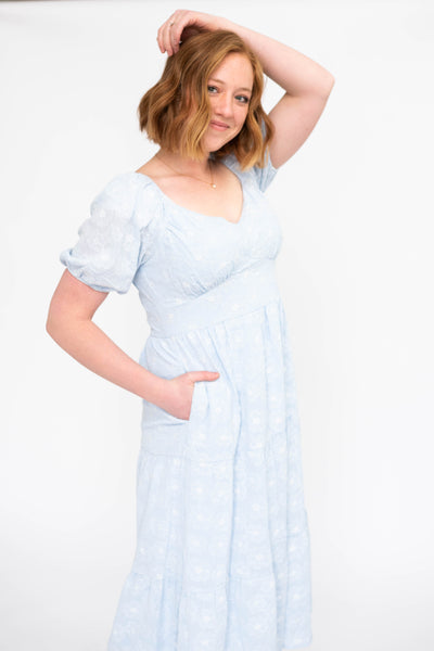 Short sleeve light blue dress with pockets and sweat heart neckline