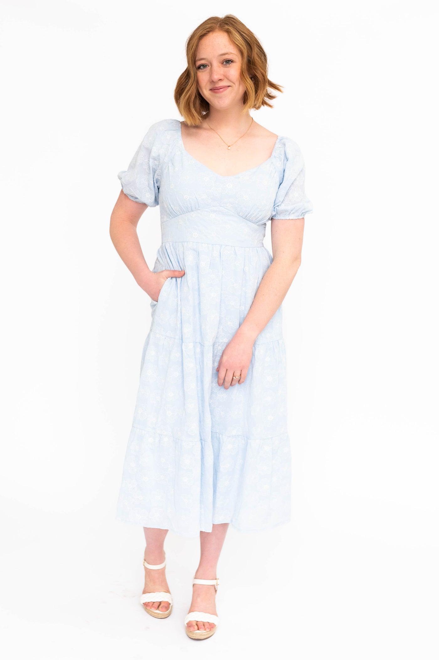 Light blue dress with sweat heart bodice and pocket