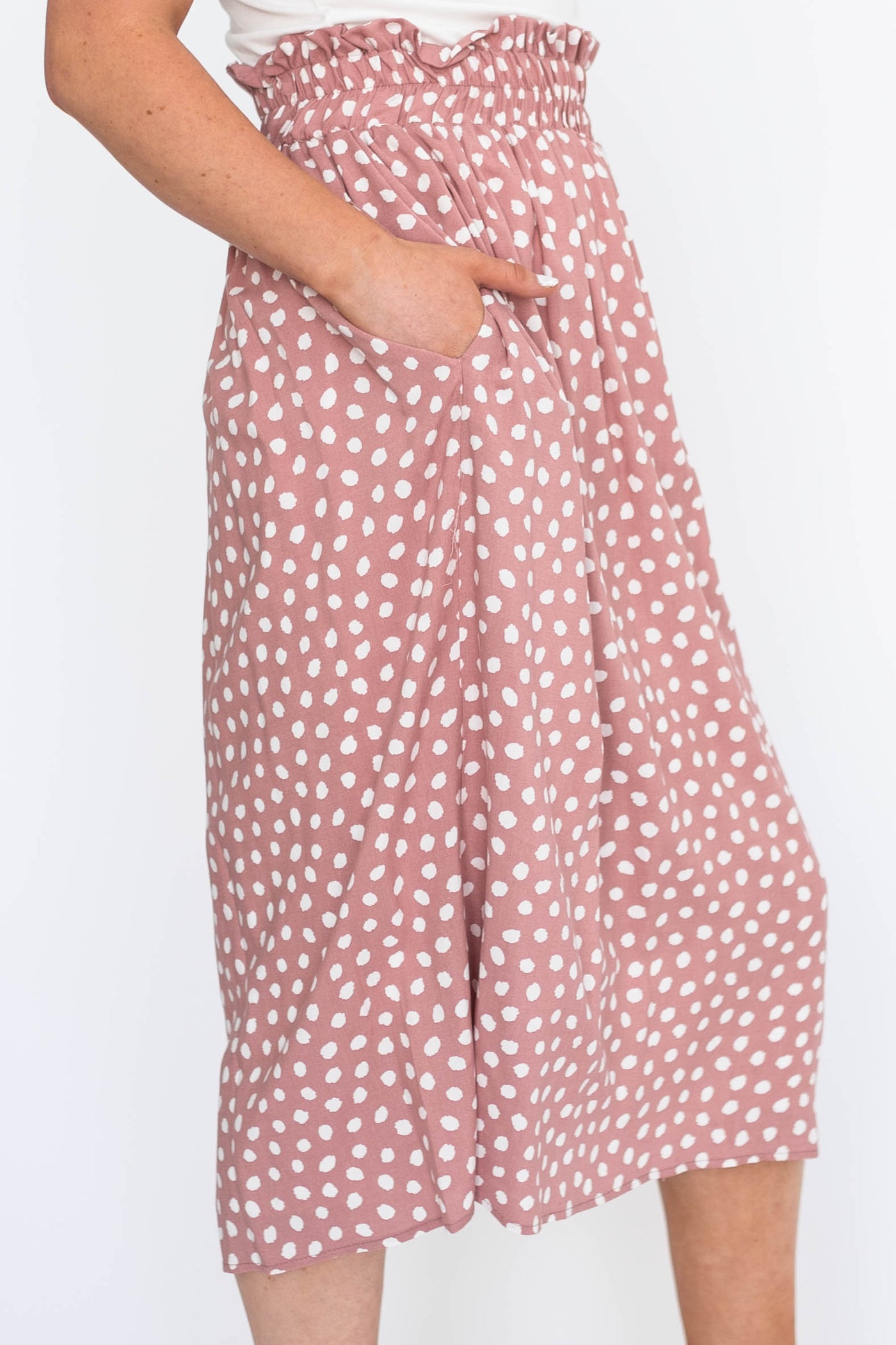 Side view of a rose skirt with pockets