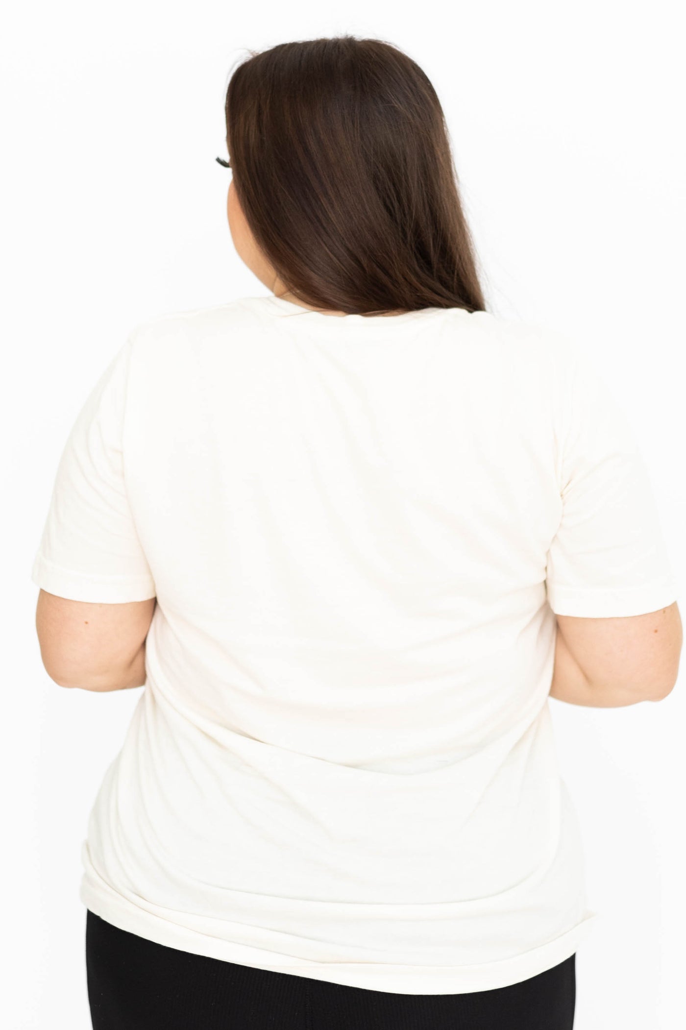 Back view of a plus size cowgirls cream tee