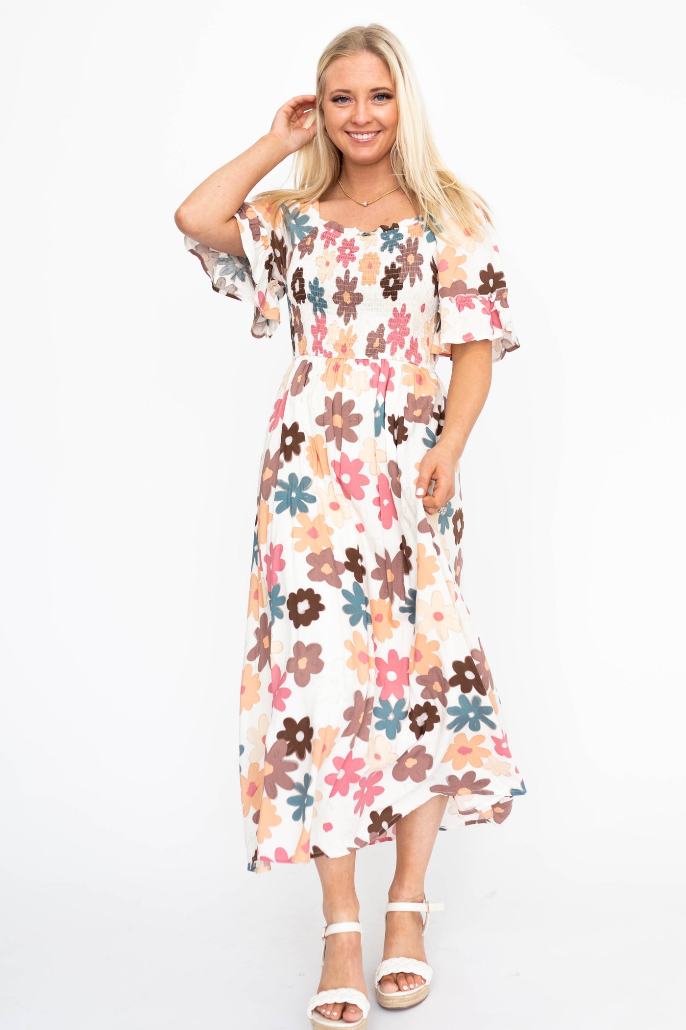 Cream floral dress with short sleeves
