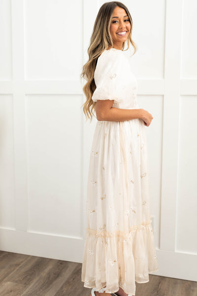 Side view of an ivory dress