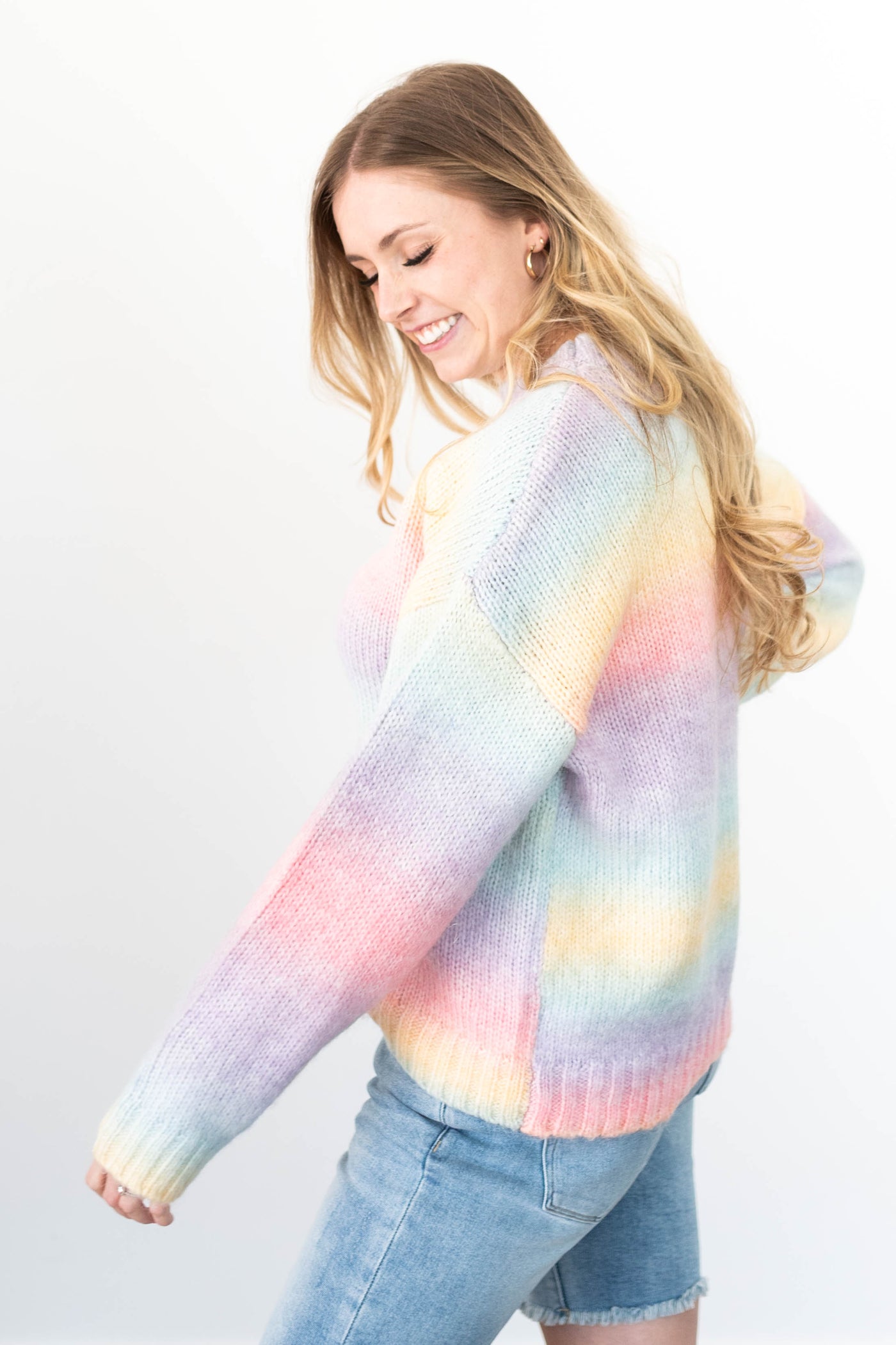 Side view of a pastel sweater