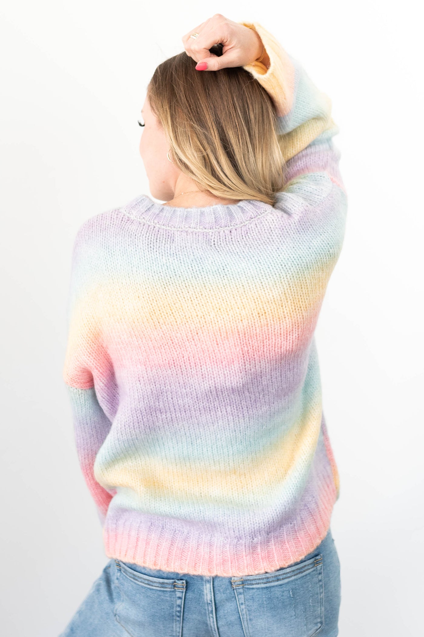 Back view of a pastel sweater