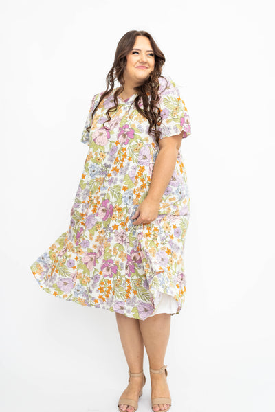 Plus size ivory floral dress with short sleeve and tiered skirt
