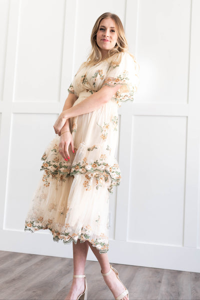 Cream lace dress with a high waist