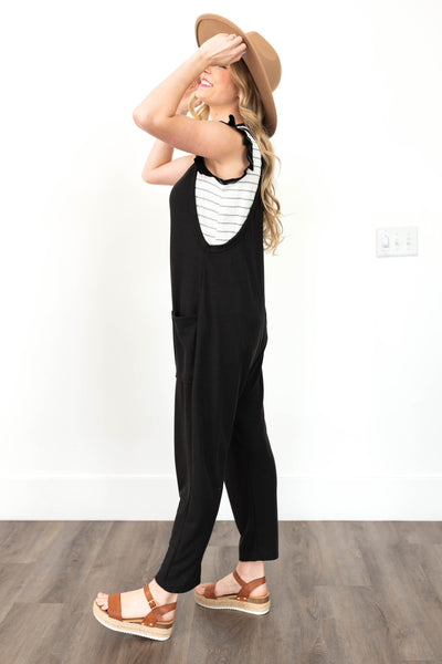 Side view of a black jumpsuit