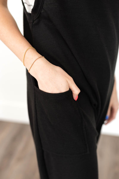 Pocket of a black jumpsuit