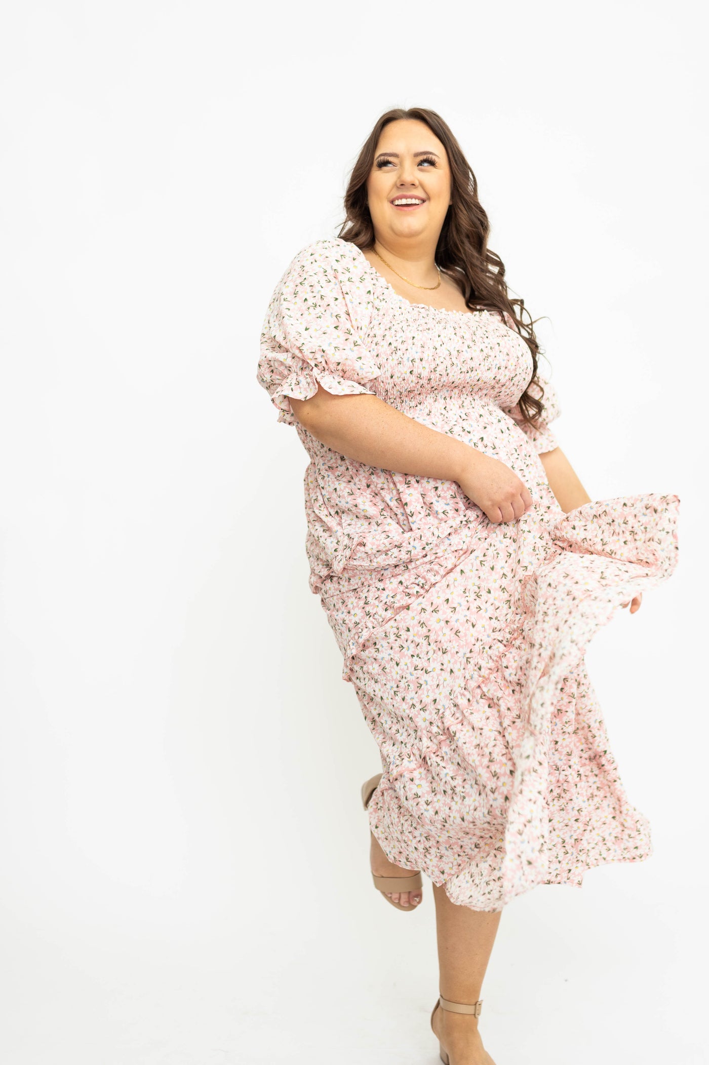 Plus size pink floral dress with puff sleeves