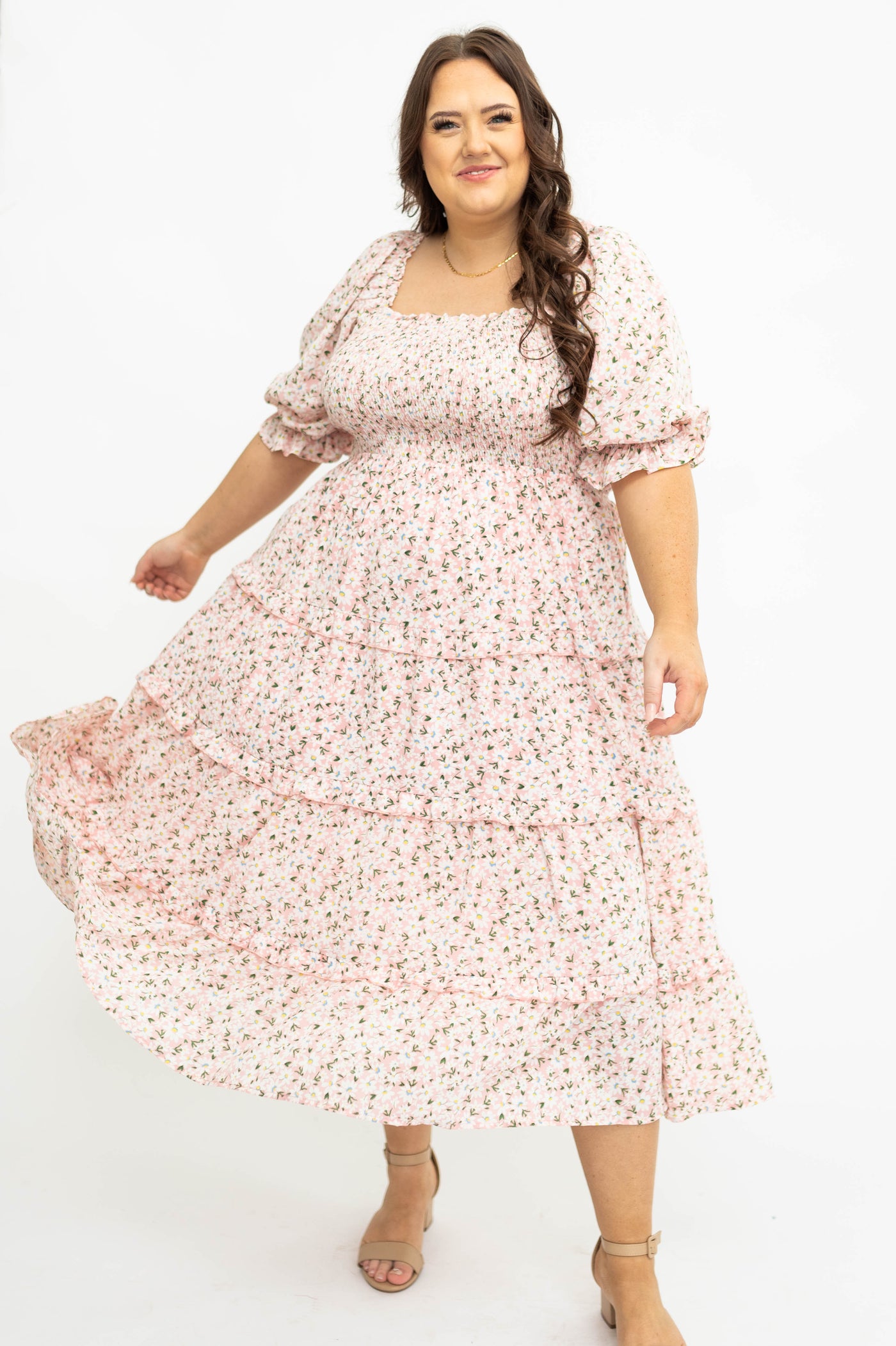Plus size pink floral dress with smocked bodice