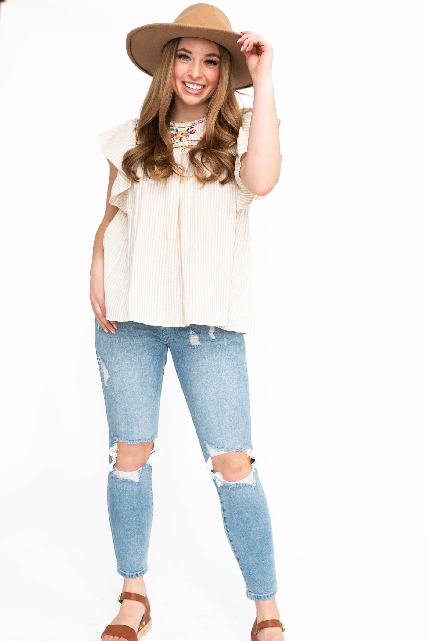 Short ruffle sleeves of a oatmeal top