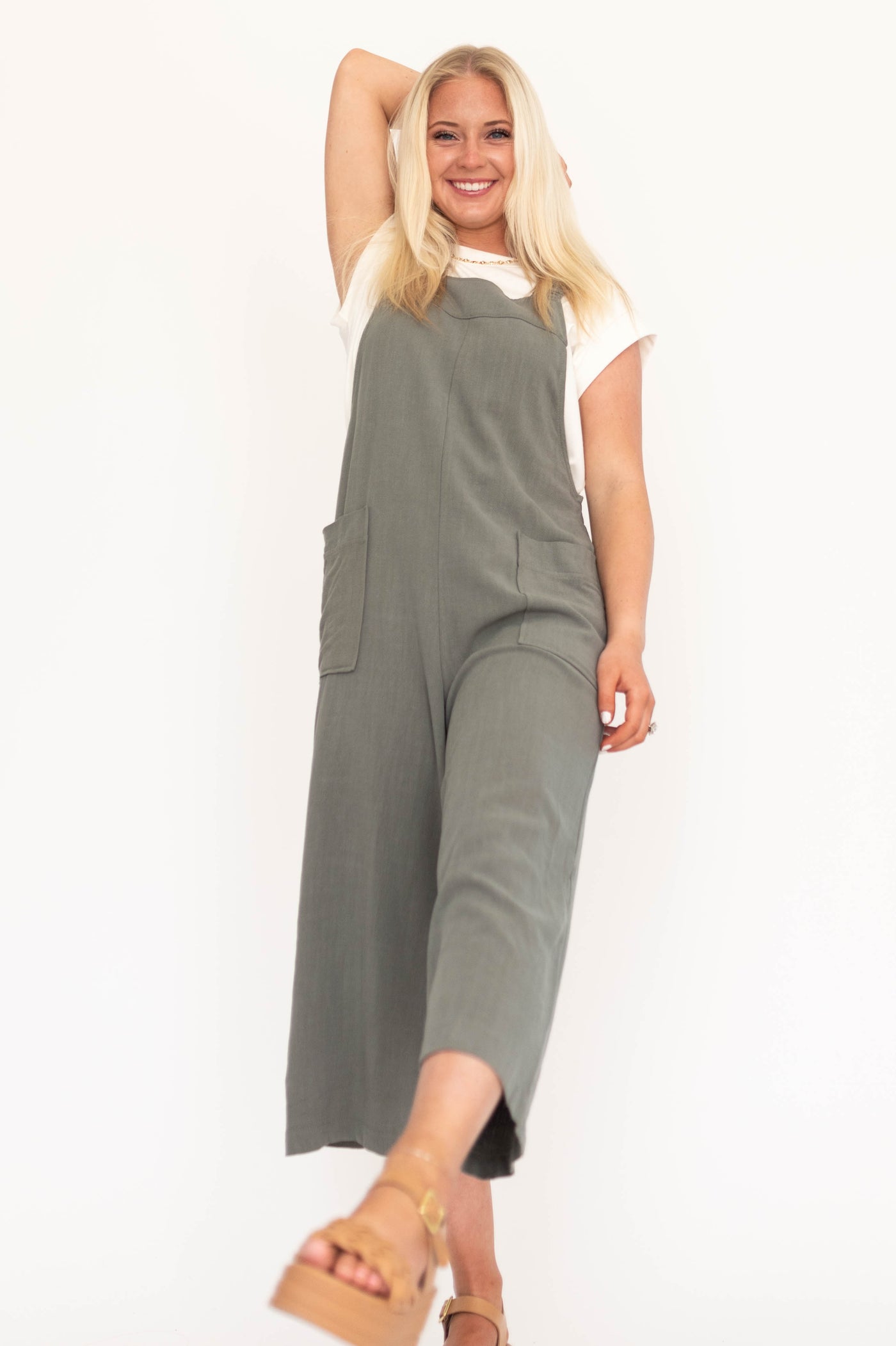 Olive jumpsuit with wide legs and cropped