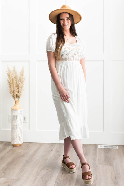 Short sleeve ivory dress with embroidery on the bodice