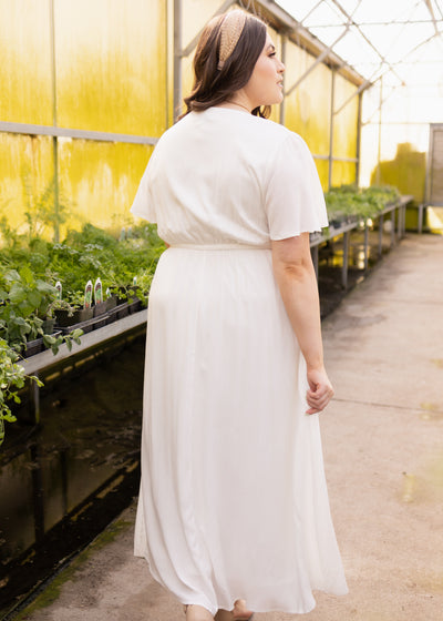 Back view of a plus size white dress