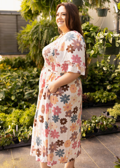 Side view of a plus size floral dress