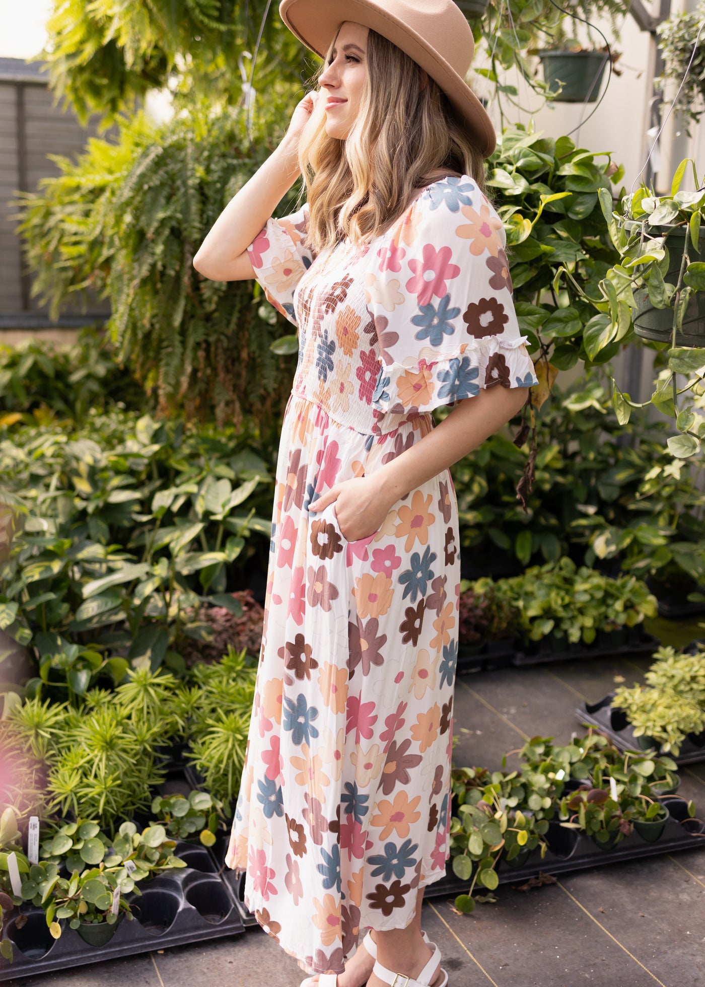 Side view of a floral dress with short sleeves