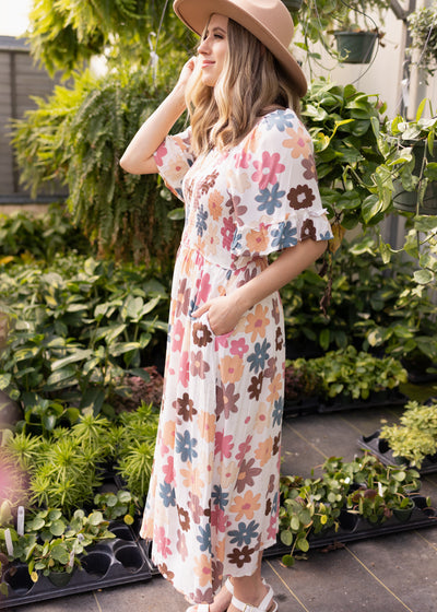 Side view of a floral dress with short sleeves