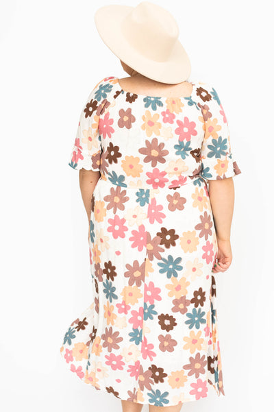 Back view of a plus size floral dress