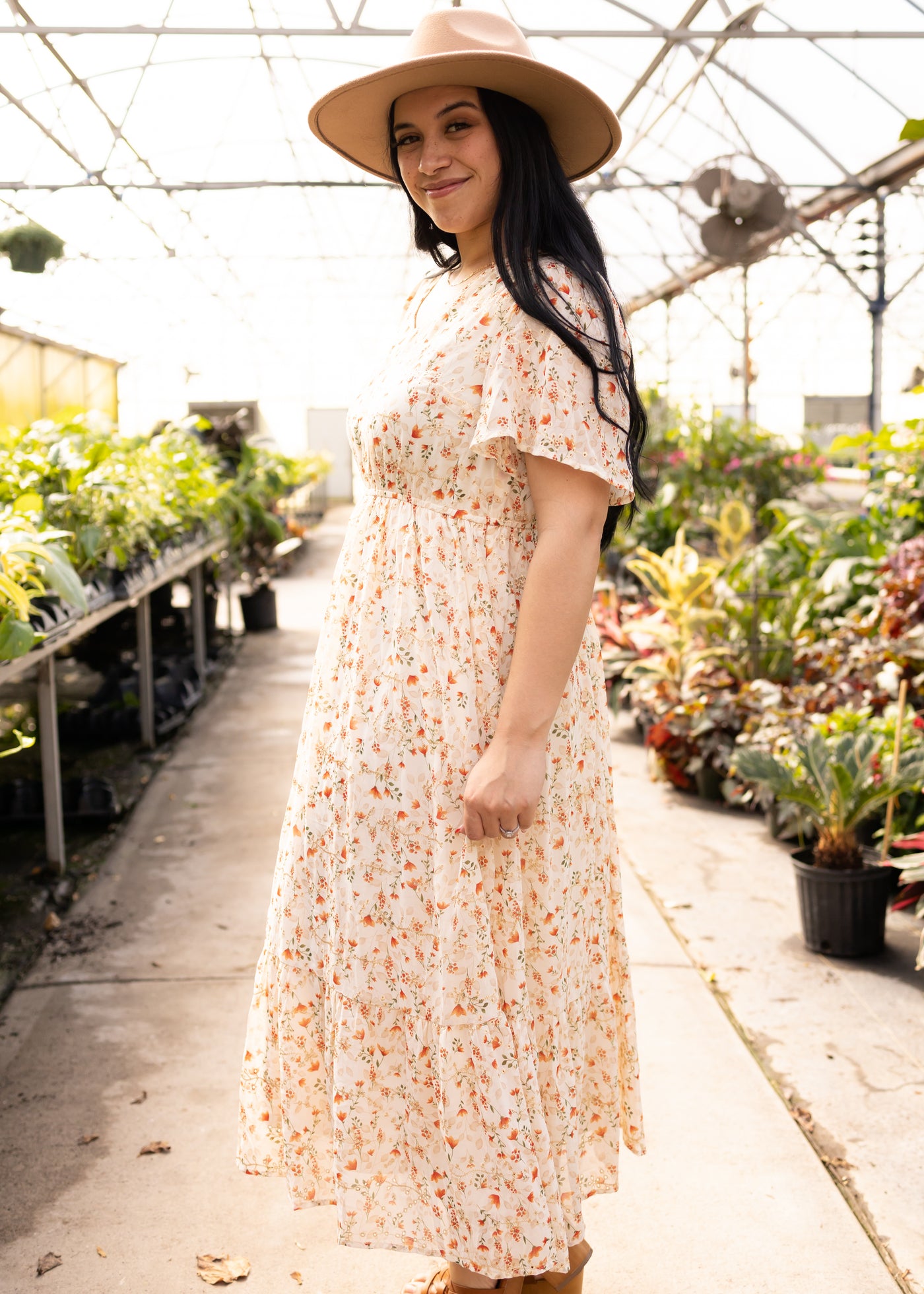 Side view of a cream floral dress