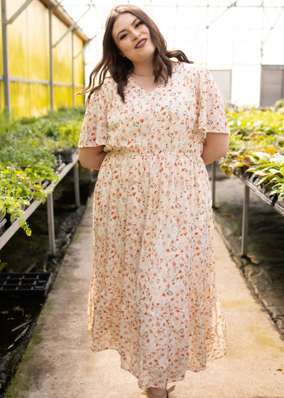 Short sleeve plus size cream floral dress with little red flowers