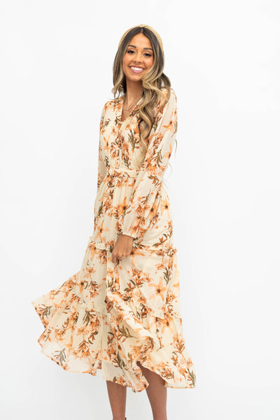 Cream dress with flowers and a button up bodice