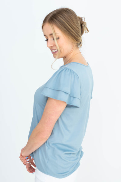 Side view of a blue top
