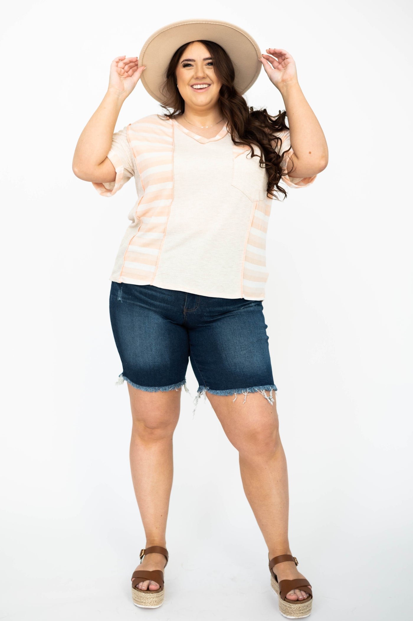 Plus size dark wash shorts with a plus size oatmeal top that is sold separately