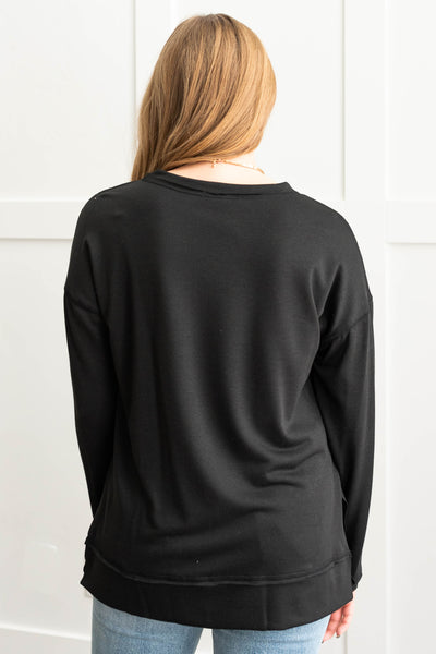Back view of a black top
