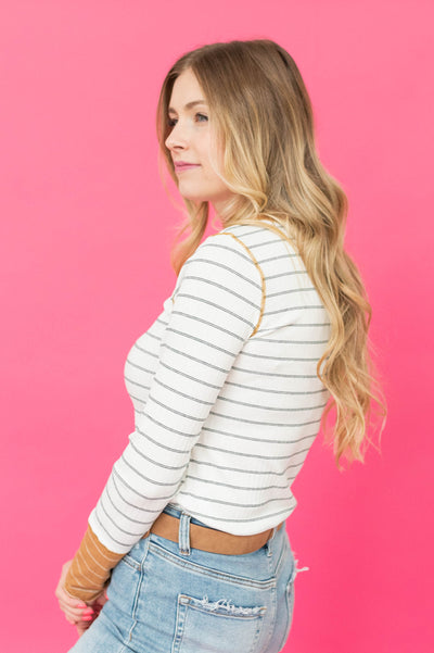 Side view of a brown striped top