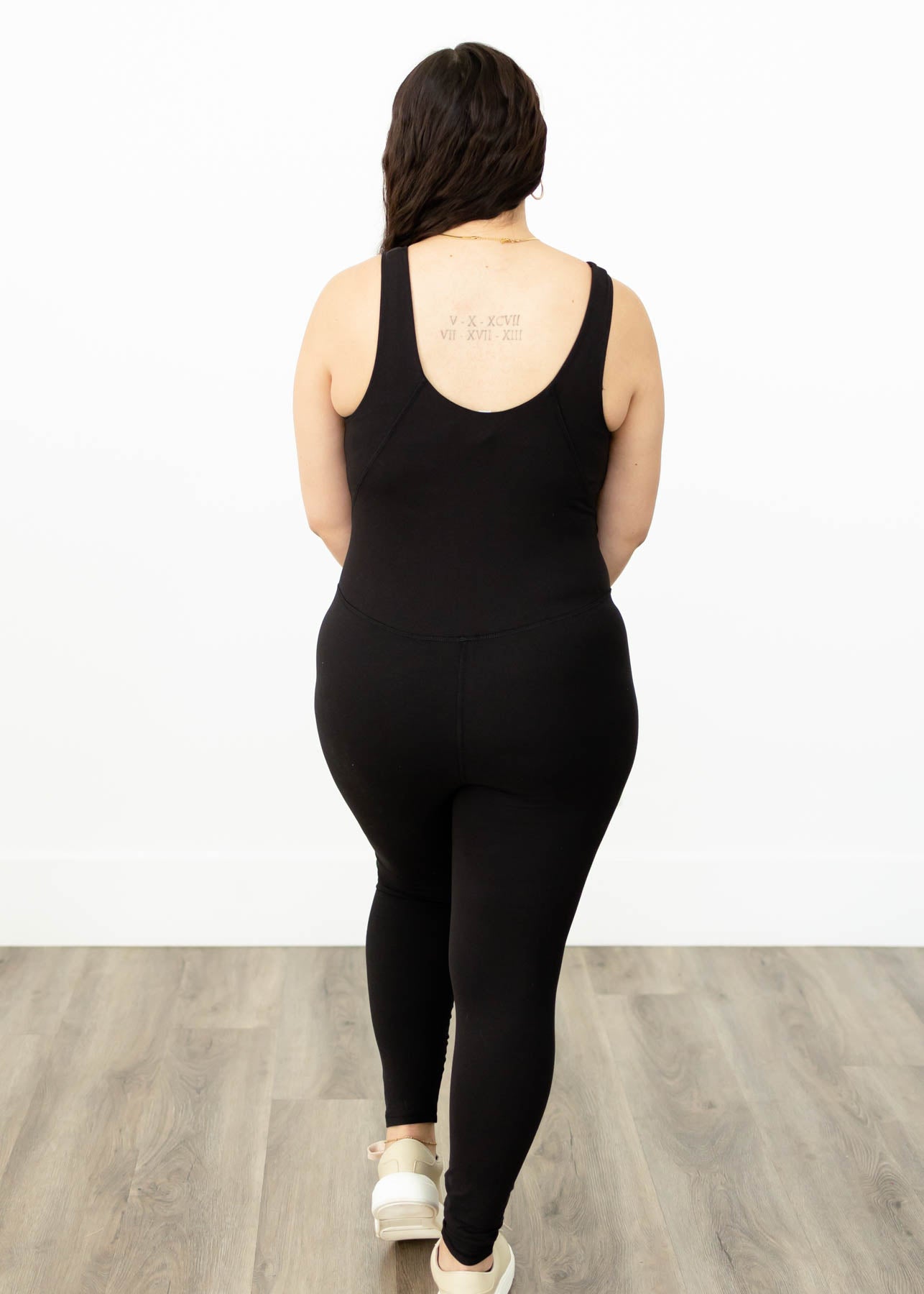 Back view of a large black bodysuit