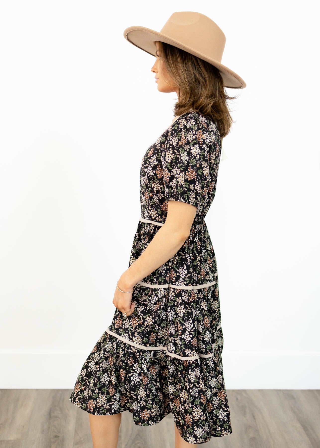 Side view of a black floral dress