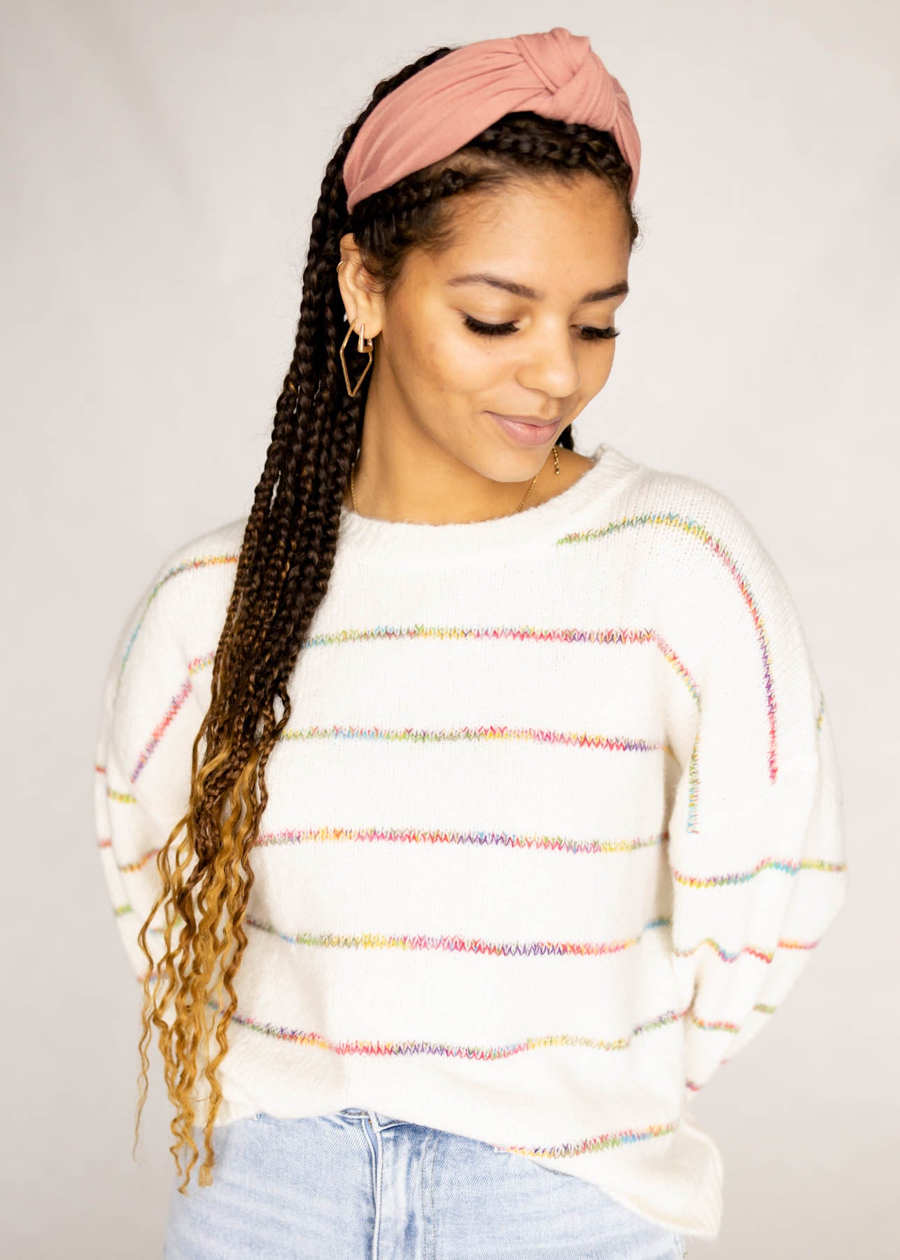 Long sleeve ivory sweater with rainbow stripes