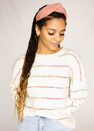 Long sleeve ivory sweater with rainbow stripes