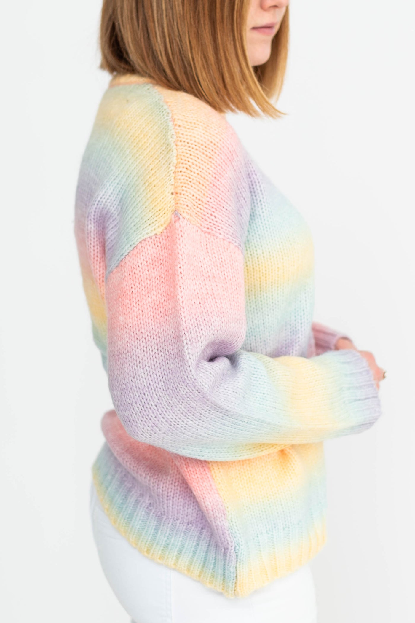 Side view of a pastel sweater