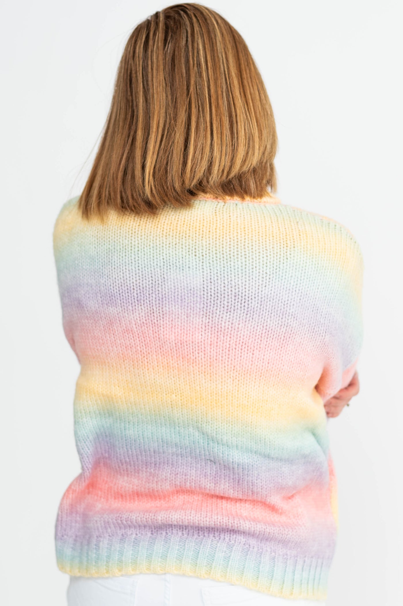 Back view of a pastel sweater