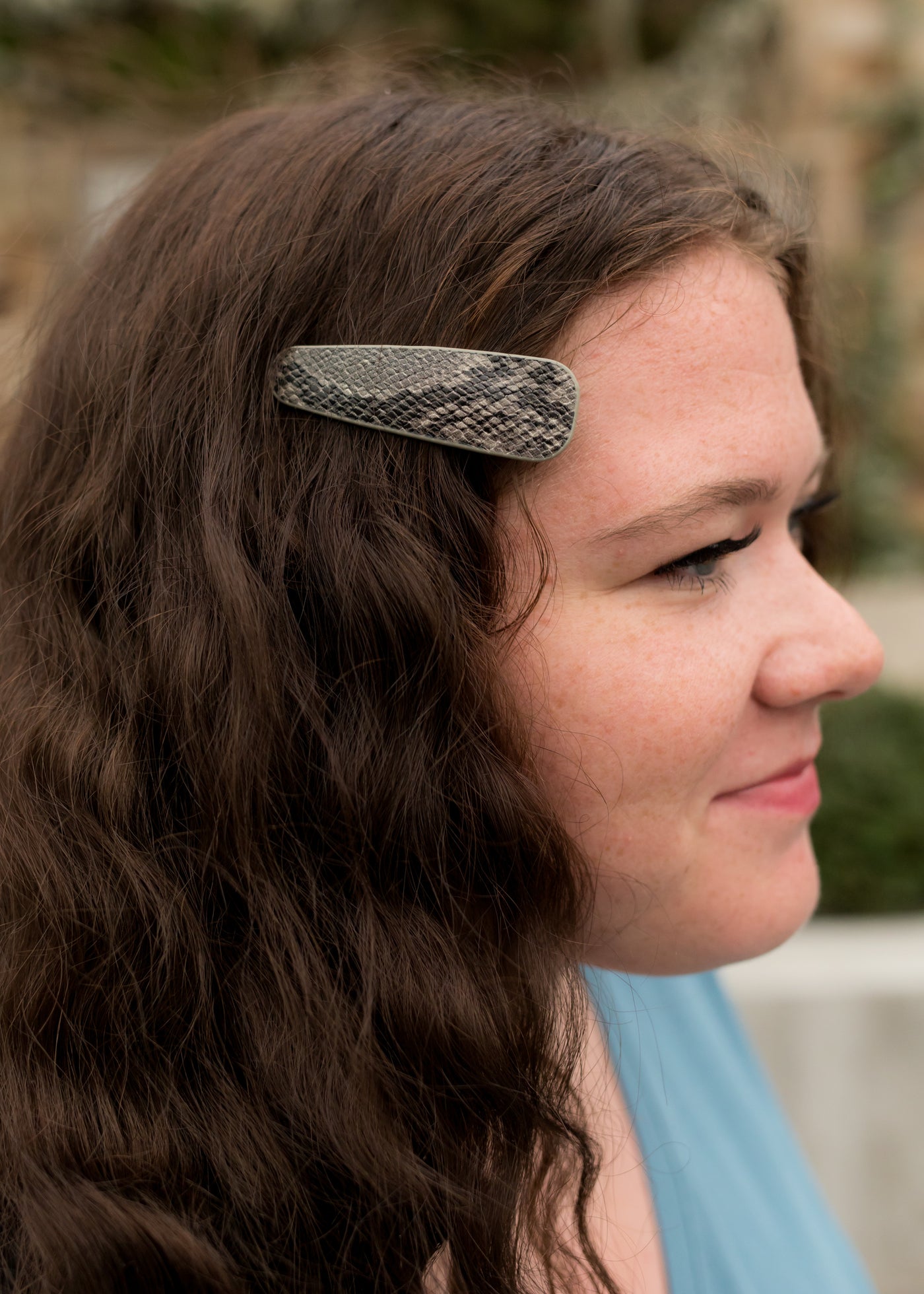 Grey, snake print hair clip. 