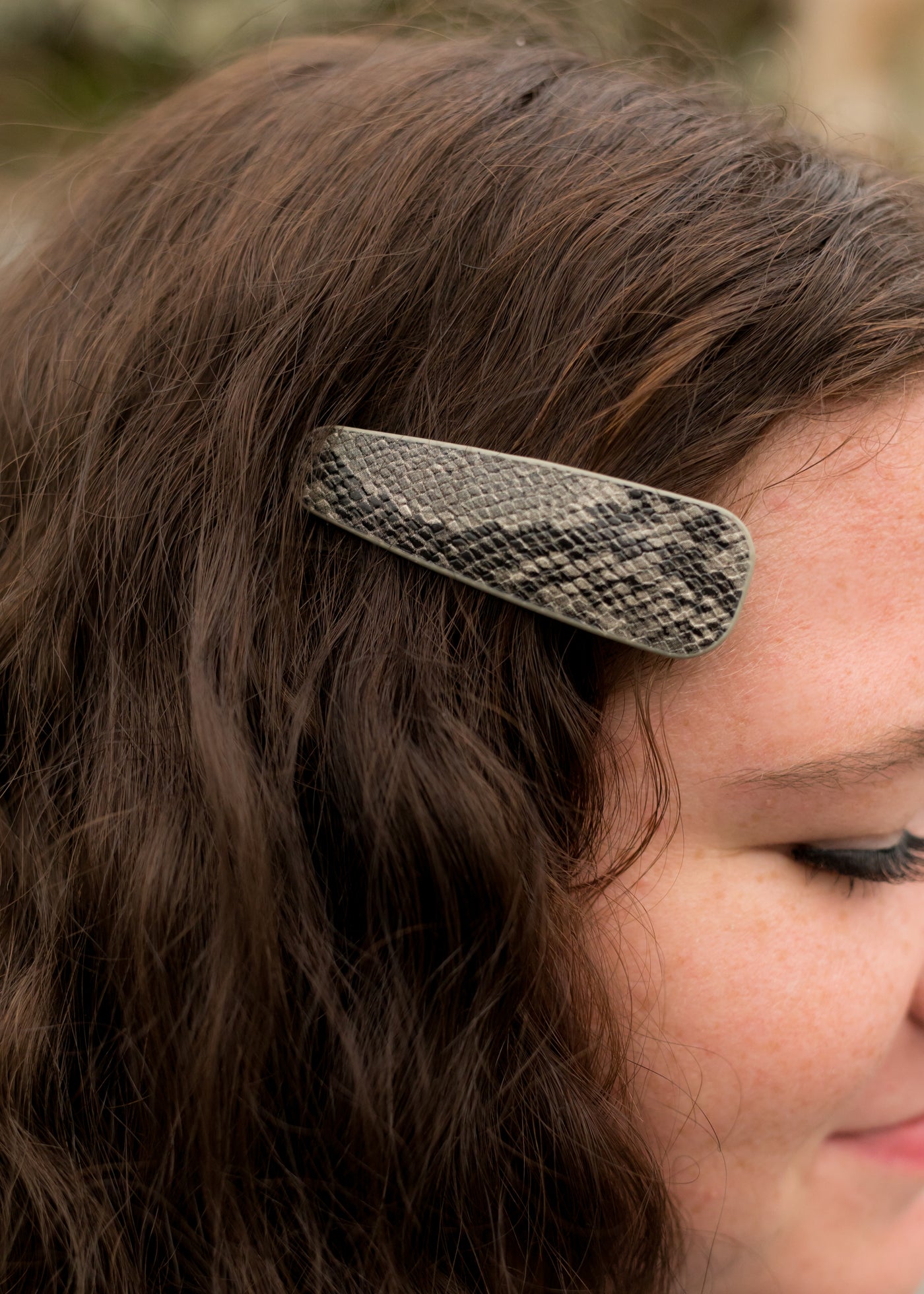 Grey, snake print hair clip. 