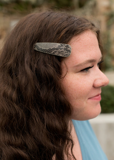 Grey, snake print hair clip. 