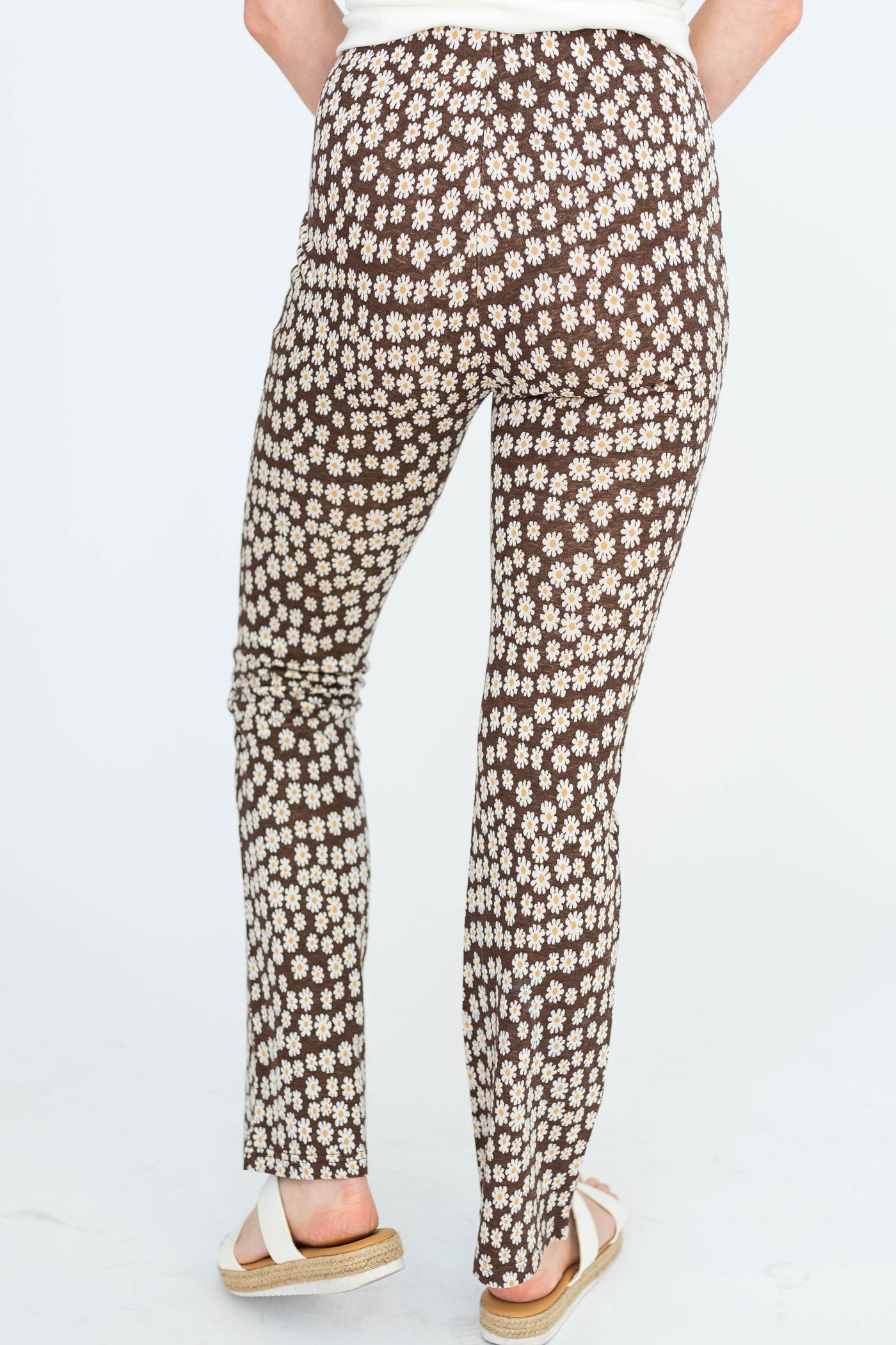 Back view of brown floral pants