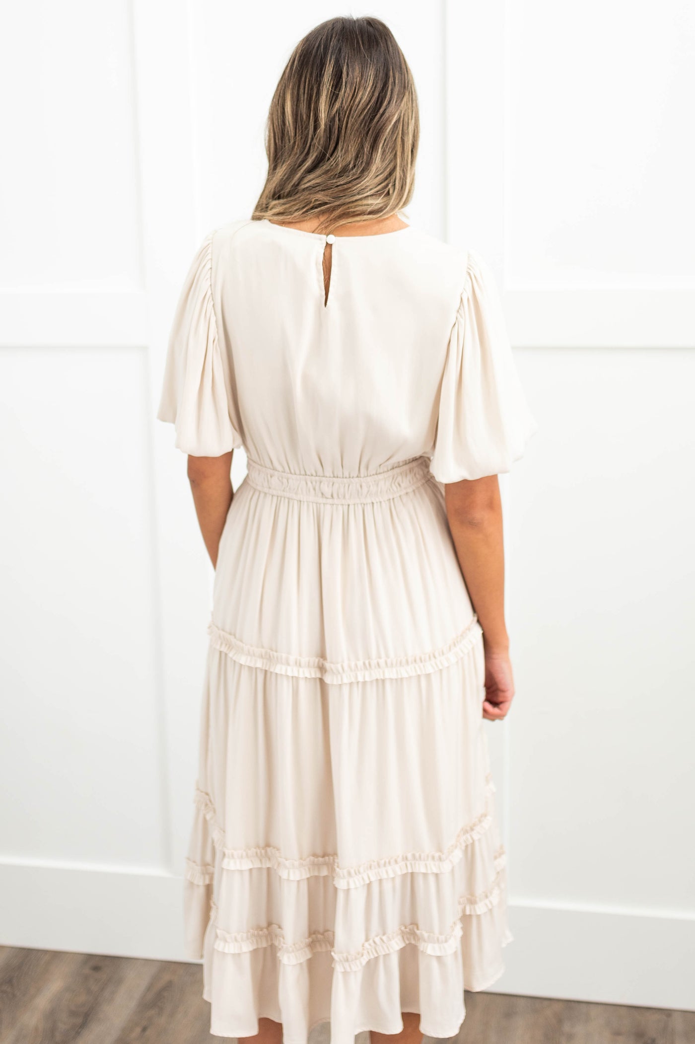 Back view of a cream dress