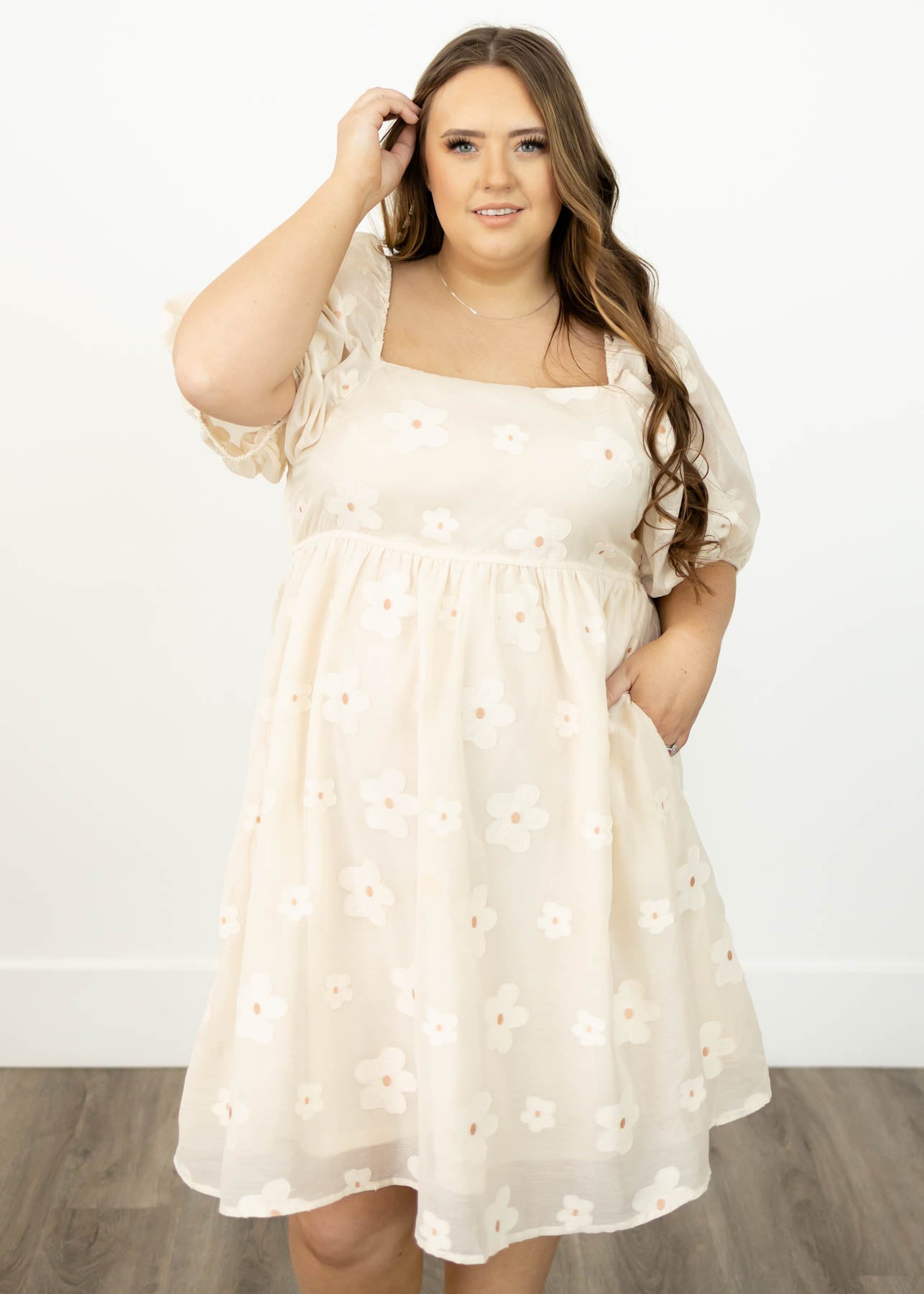 Plus size cream floral dress with a square neck