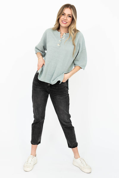Elbow length sleeves on a dusty sage top