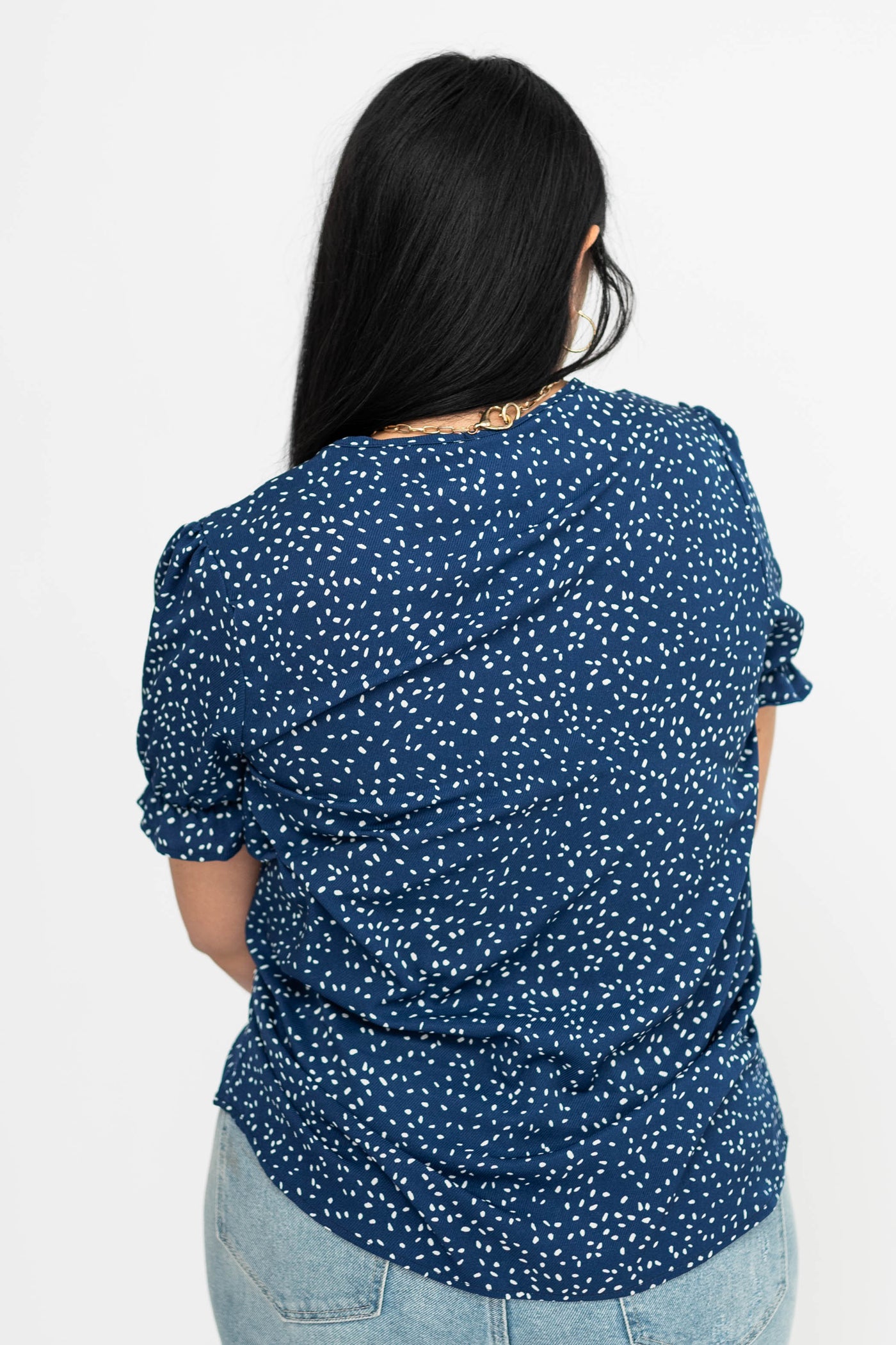Back view of a large navy top