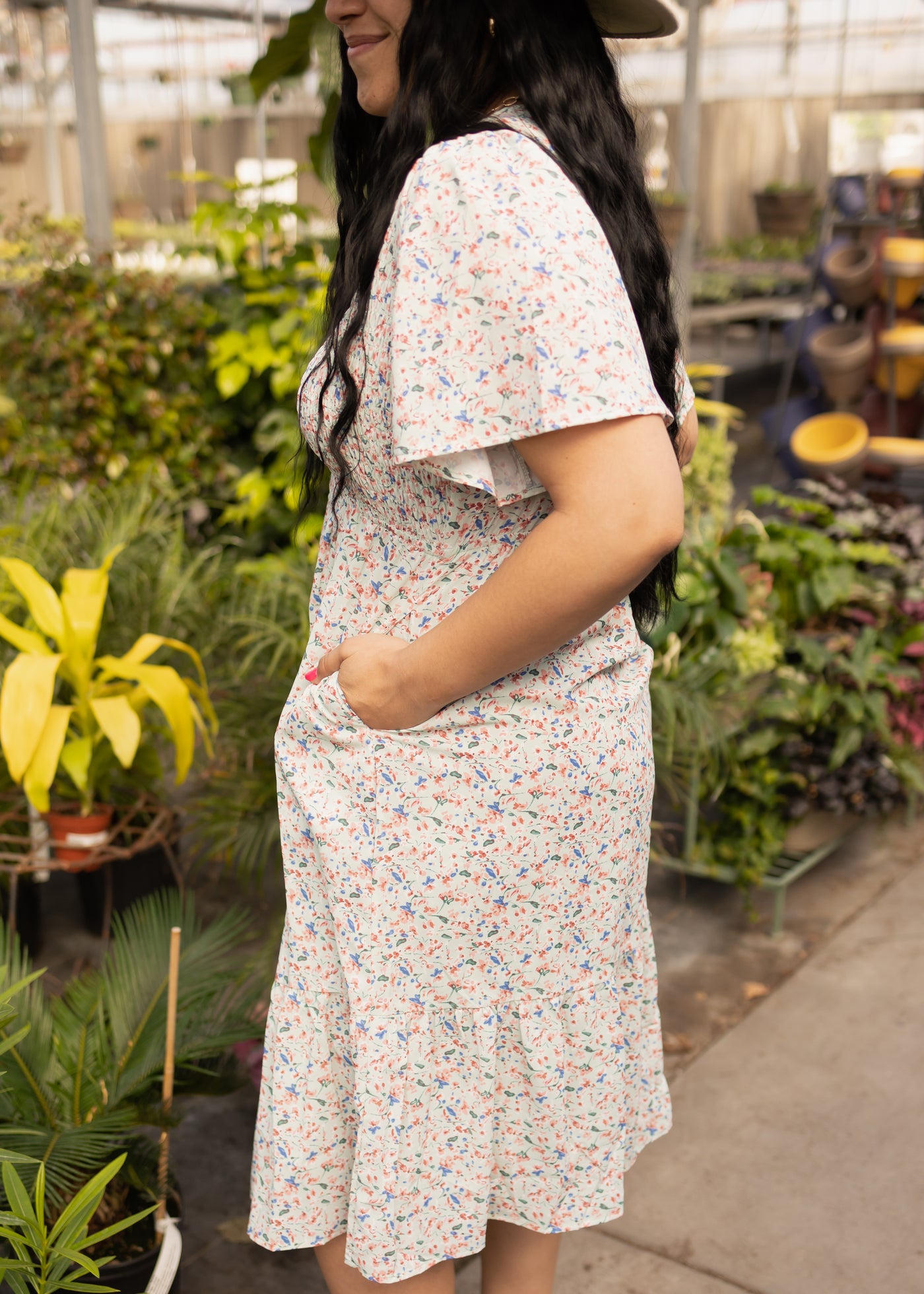 Side view of a mint floral dress