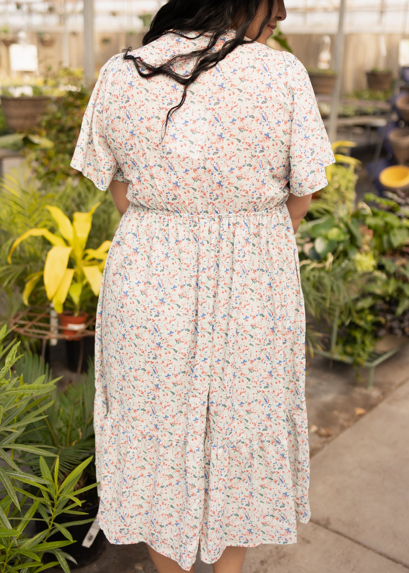 Back view of a mint floral dress